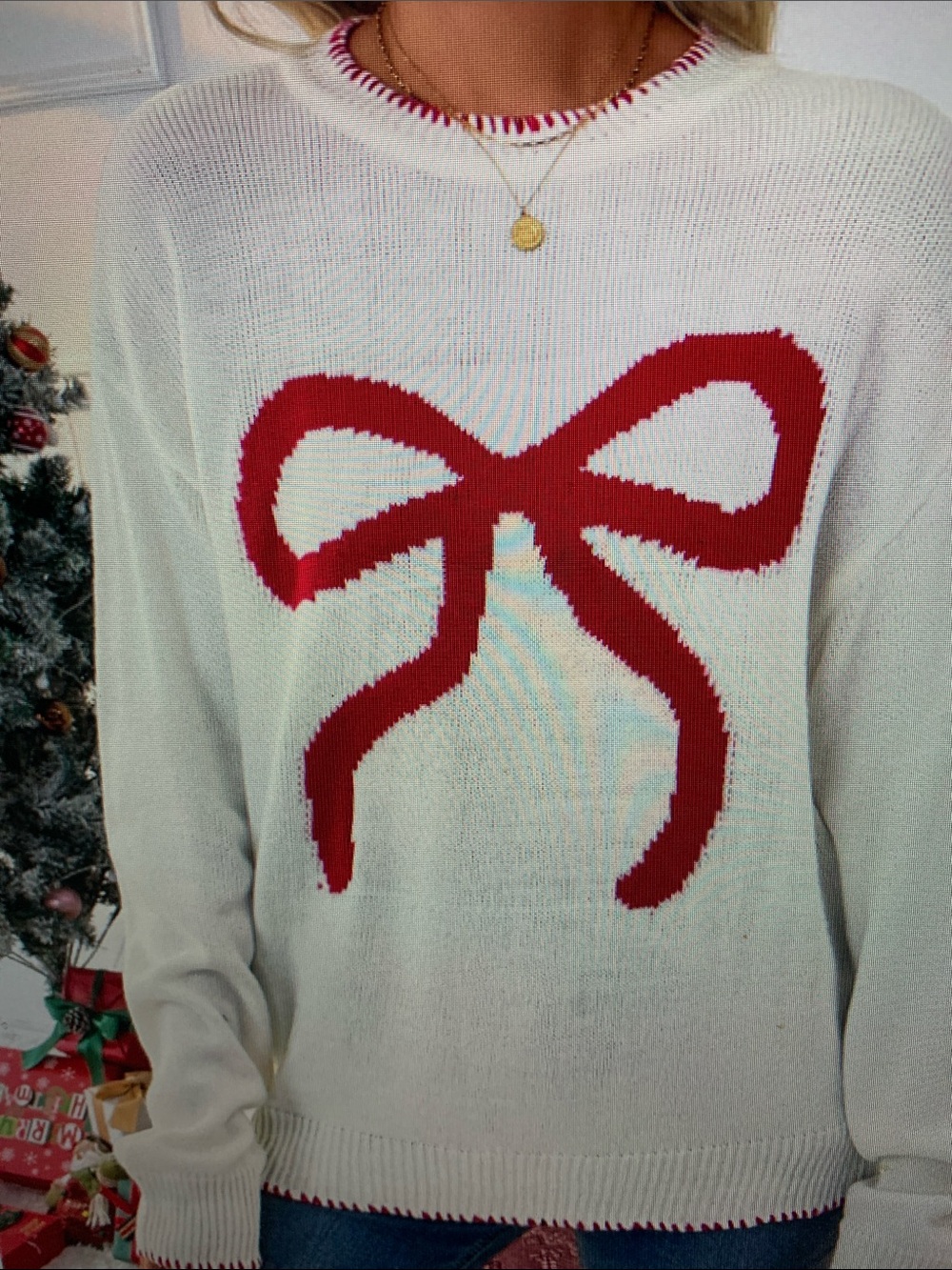 Women's Cream Knit Sweater with Red Bow Design